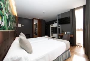 Quadruple Room room in Malaga Premium Hotel