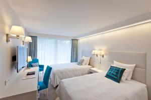 Superior Twin Room with Garden View room in Mondorf Parc Hotel