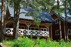 Domki Kaszuby - jezioro las i zoo w Szarlocie - 科希切日纳