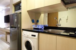 Artistic Studio Apartment at The Oasis Cikarang By Travelio