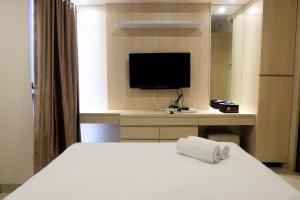 Artistic Studio Apartment at The Oasis Cikarang By Travelio