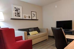 King Suite with Sofa Bed and Living Room - Non-Smoking room in Comfort Inn & Suites Slidell