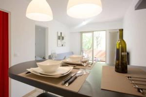 Appartements Dans un ecrin de verdure : photos des chambres