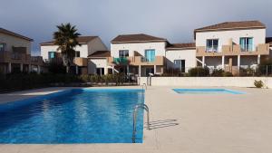 Bel appartement confortable et cosy en résidence avec piscine à 5 mn de la mer