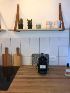 Appartements Place aux huiles : photos des chambres