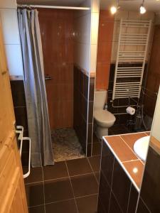 Appartements le coin tranquille : photos des chambres