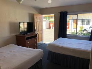 Queen Room with Two Queen Beds room in Ocean Lodge - Santa Cruz