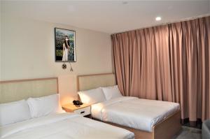 Double Room with Two Double Beds room in LIC Plaza Hotel