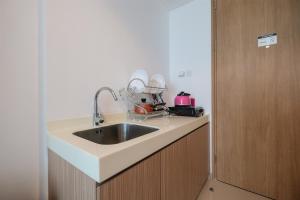 Fabulous Tree Park City Cikokol Studio Apartment near Shopping Mall By Travelio