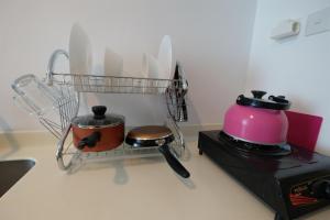 Fabulous Tree Park City Cikokol Studio Apartment near Shopping Mall By Travelio