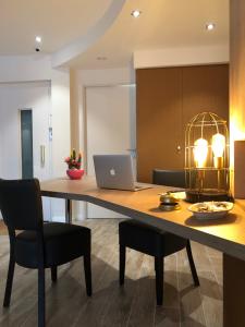 Hotels Hotel Courbet : photos des chambres