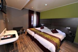 Hotels LOGIS Hotel de Bourgogne - Macon : photos des chambres