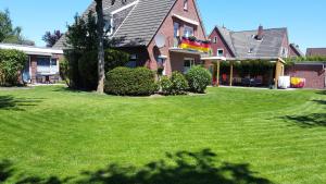 Wohnung 2 mit Balkon- Haus Annegrete Seestr6, Bensersiel