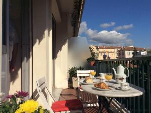 Appartements Place Mozart Holiday Apartment : photos des chambres