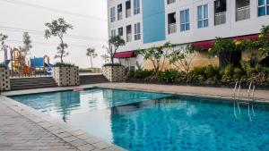 Comfortable Studio Apartment Grand Dhika City By Travelio