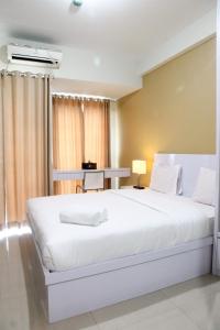 Comfortable Studio Apartment Grand Dhika City By Travelio