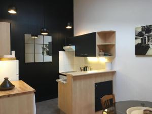 Appartements Hotel de Ville 3 et Parking : photos des chambres