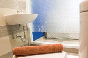 Simple Studio Room at Guest House Way Seputih near Central Park By Travelio