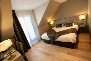 Hotels Logis Hotel Restaurant Le Moulin de la Coudre : photos des chambres