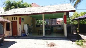 Ekas Beach Guesthouse Mitra RedDoorz