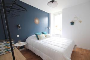 Appartements 3 Pieces a 50 metres du bord de mer : photos des chambres