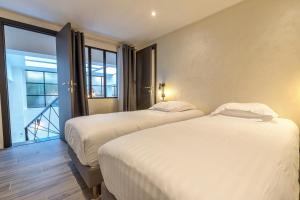 Appartements Residence Montaigne - Luxurious - 350m Palais - LRA Cannes : photos des chambres