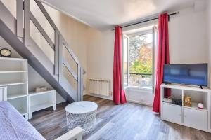 Appartements Promotion du jour - Le Cerisier - : photos des chambres