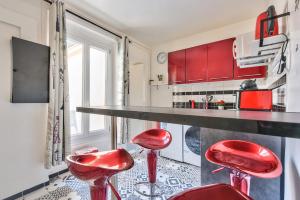 Appartements Promotion du jour - Le Cerisier - : photos des chambres