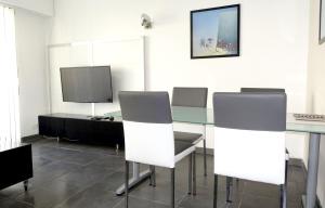 Appartements Le Palais - Appartement au centre ville avec parking prive : photos des chambres