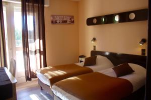 Hotels Hostellerie Saint Benoit : photos des chambres