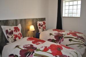 Maisons de vacances L'Orchidee a 18 minutes d'Eurexpo : photos des chambres