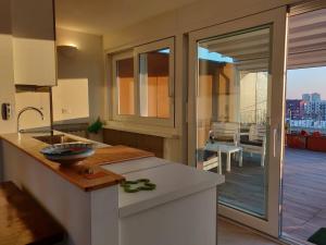 Exclusive rooftop apartment with large terrace in SolariTortona