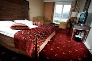 Small familyroom with lake view room in Fleischer's Hotel