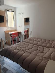 Twin Room room in Welcomotel Limoges