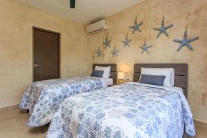 Charming Nature-Inspired Condos with Sultry Surroundings by Stella Rentals