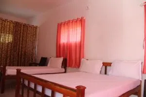 Kanthalloor Homestay Snow White Holiday Homes - 博拉吉