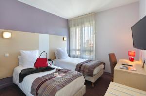 Hotels Cit'Hotel Atlantic Hotel : photos des chambres