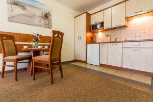 Villa Martii - Komfortowe Apartamenty z Aneksami Kuchennymi - Spokojna okolica, blisko plaży