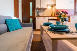 Villa Martii - Komfortowe Apartamenty z Aneksami Kuchennymi - Spokojna okolica, blisko plaży