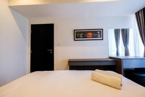 Elegant 1BR Branz BSD Apartment near AEON Mall By Travelio