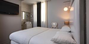 Hotels Hotel De Paris : photos des chambres