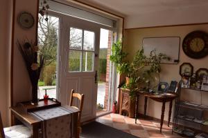 B&B / Chambres d'hotes Les Trois Pommiers : Chambre Familiale - Vue sur Jardin