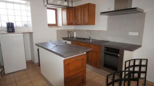 Maisons de vacances L'Orchidee a 18 minutes d'Eurexpo : photos des chambres