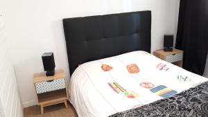 Appartements T2 clair et cosy : photos des chambres