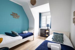 Appartements Anemone by Cocoonr : photos des chambres