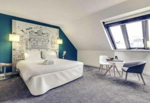 Hotels Hotel Mercure Paris Centre Gare Montparnasse : photos des chambres