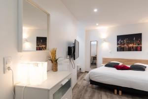 Appartements CityCosy Strasbourg - Studio Hirtz Orangerie : photos des chambres