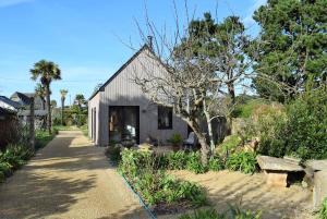 Maison NEUVE avec jardin clos à 150m de la plage de Tourony 31