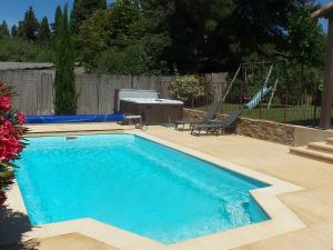 Villas Villa with air con heated pool bubble bath fenced garden and kids play equipment : photos des chambres