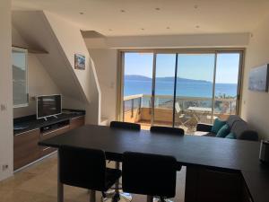 Appartements T2 en duplex avec solarium face mer : photos des chambres